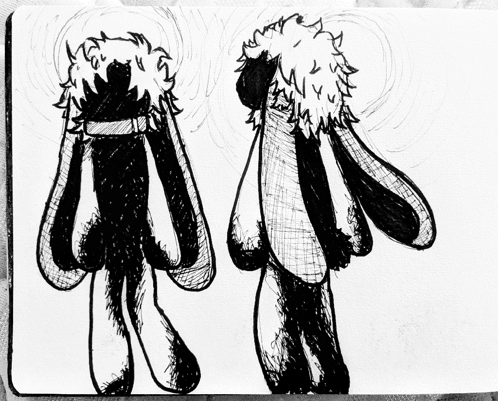black and white rabbit plushie, with long ears and a collar